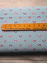 Light Blue Cheerful Rainbow Print Swiss Dot Knit {by the half yard}