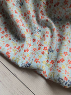 Light Blue & Petite Red Floral Opaque Swiss Dot 100% Polyester {by the half yard}