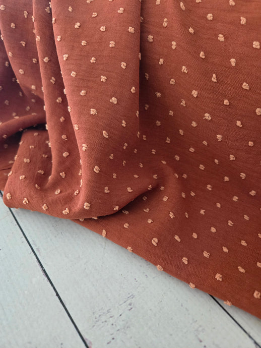 Rust Petite Opaque Swiss Dot 100% Polyester {by the half yard}