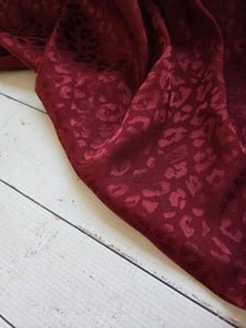 Solid Burgundy Animal Print Polyester {by the half yard}